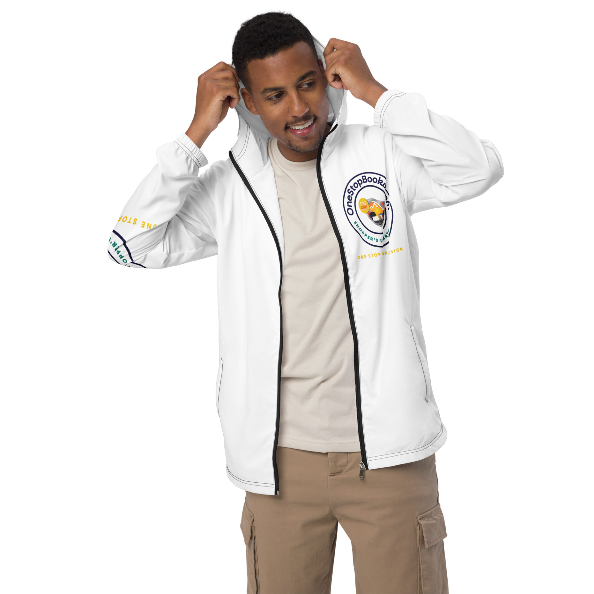 Man wearing a white jacket with a logo.