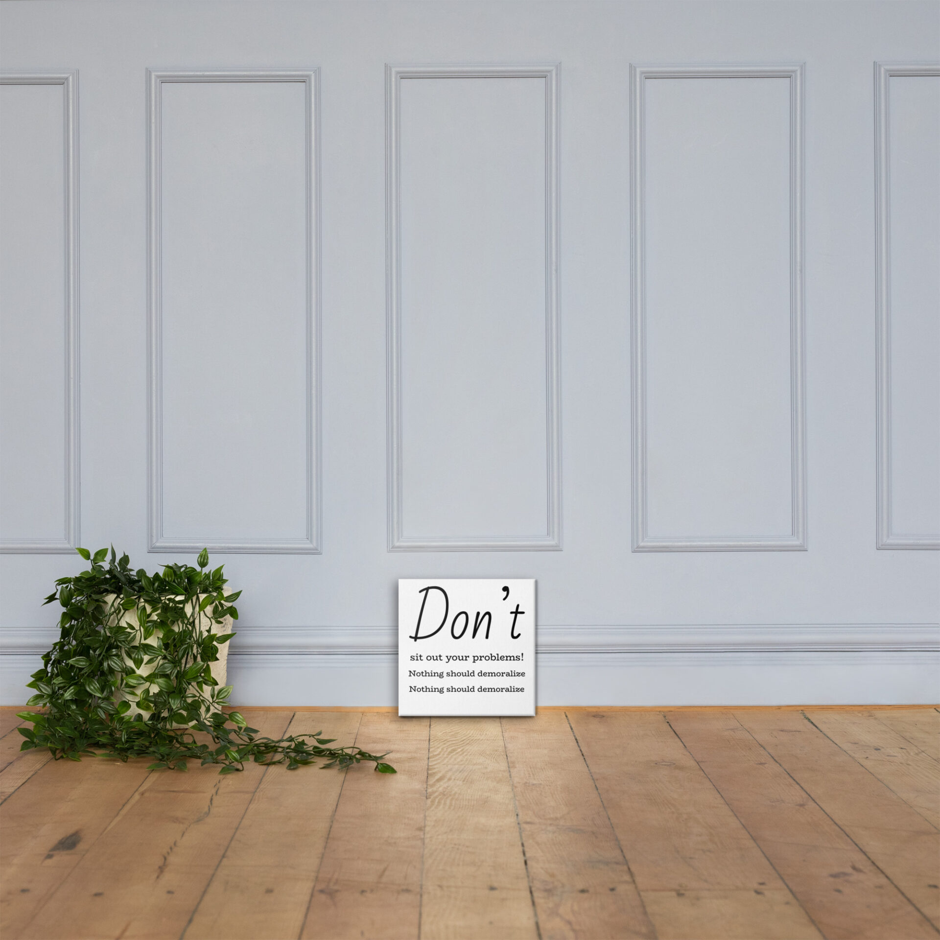 Motivational quote on white canvas.