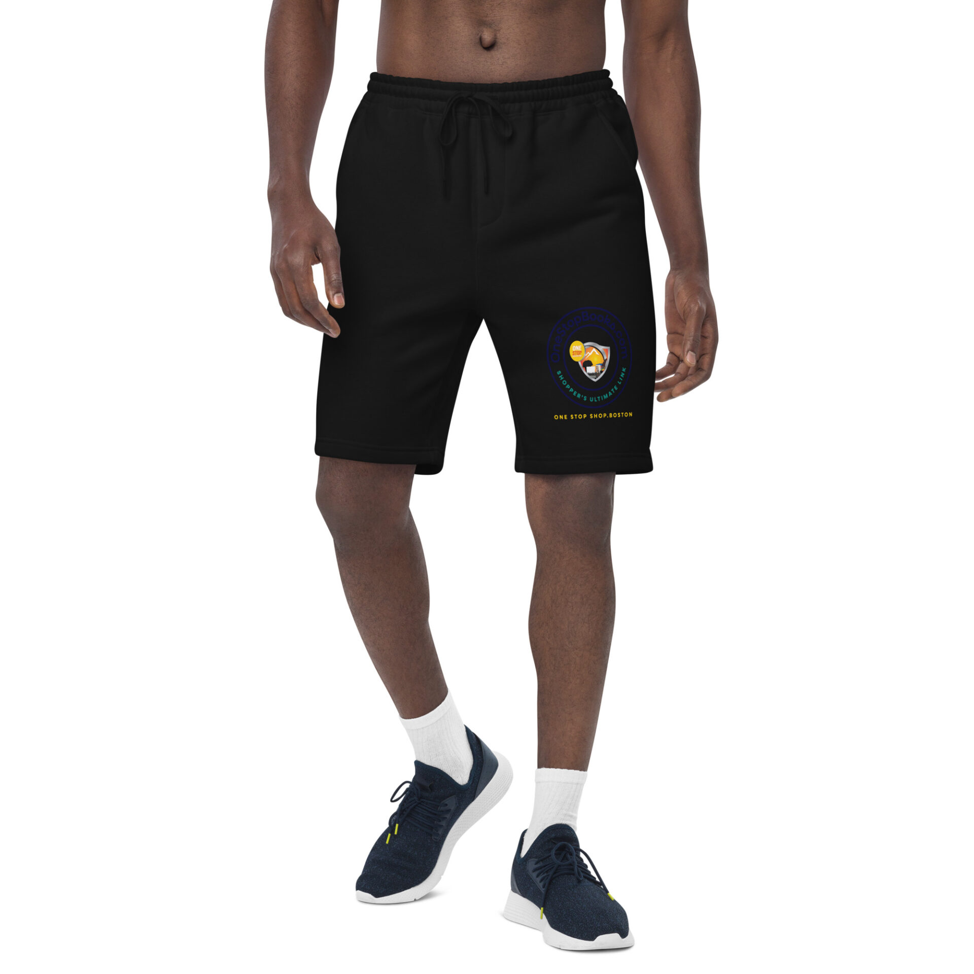 Man wearing black sweatpants with logo.