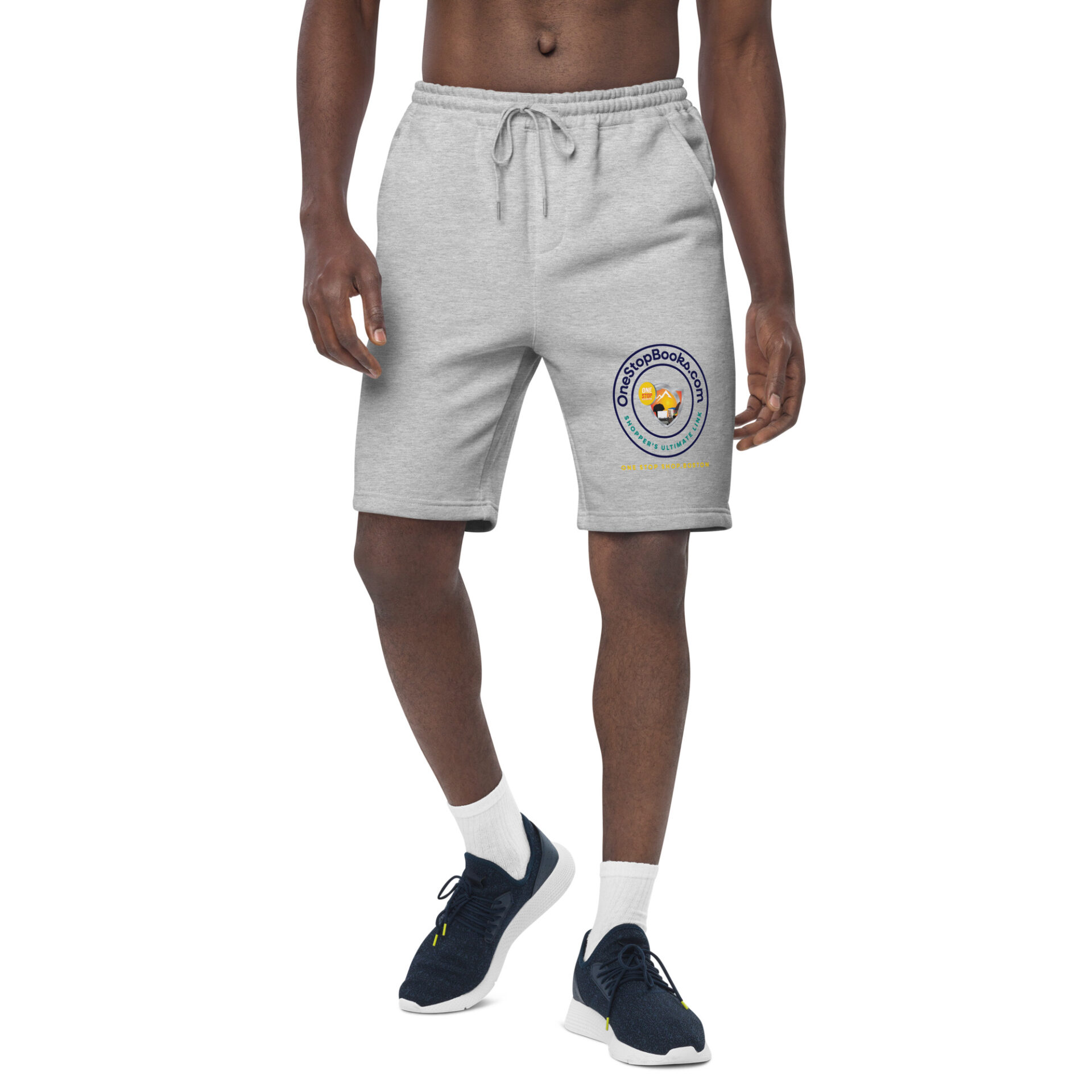 Man wearing gray sweatpants with logo.