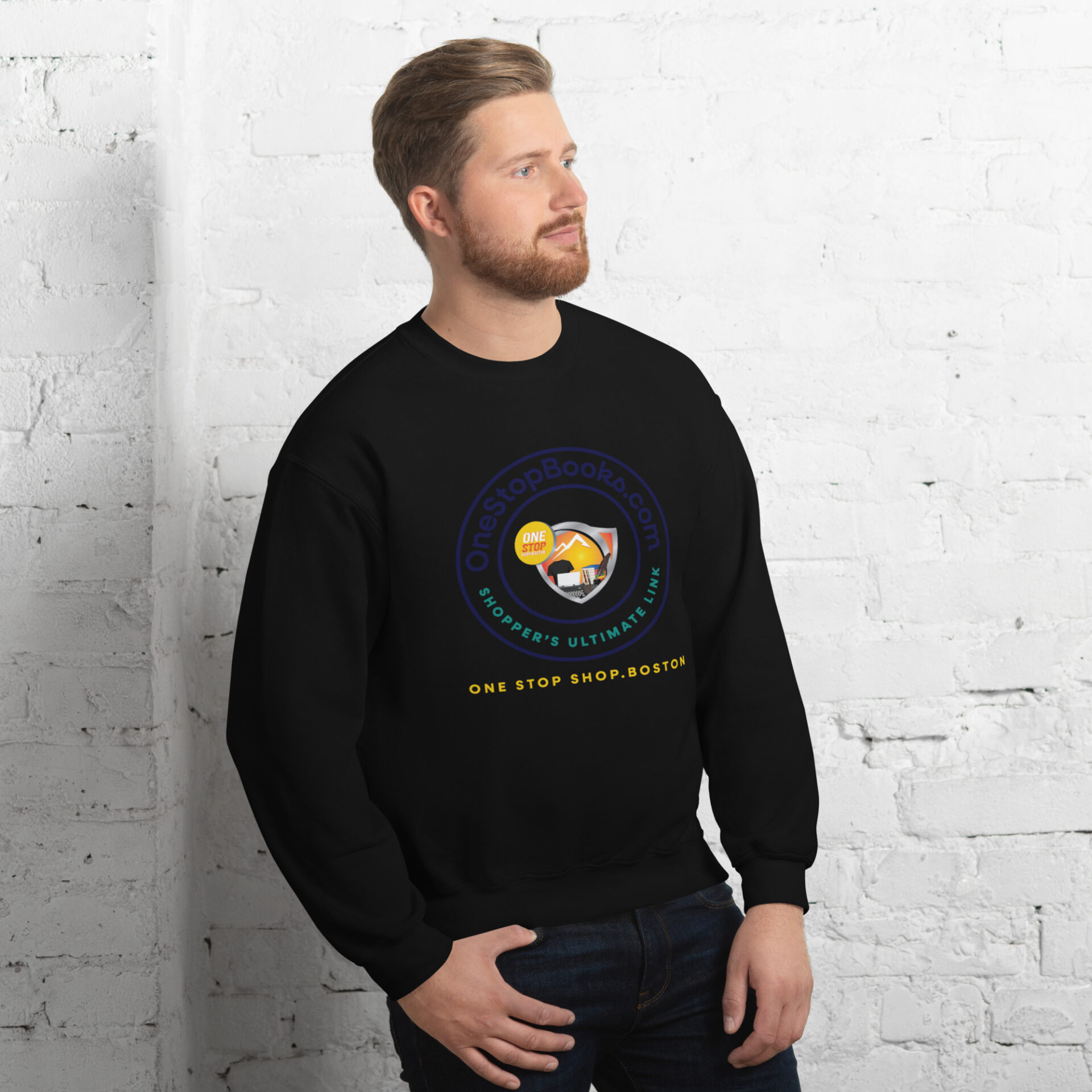 Man wearing a black sweatshirt with a logo.