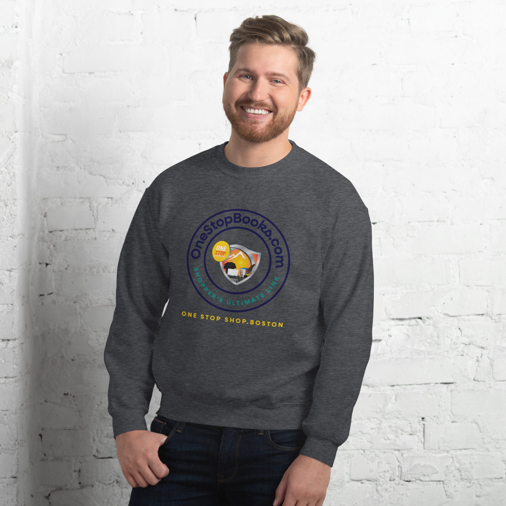 Man wearing grey sweatshirt with One Stop Books logo.
