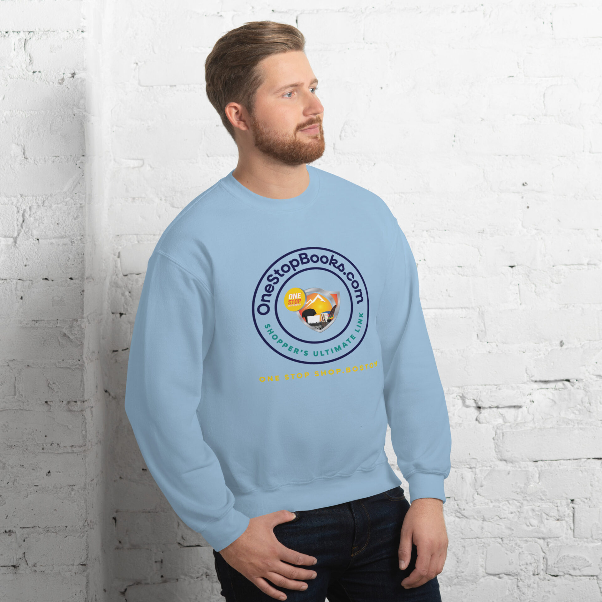 Man wearing a blue sweatshirt with a logo.