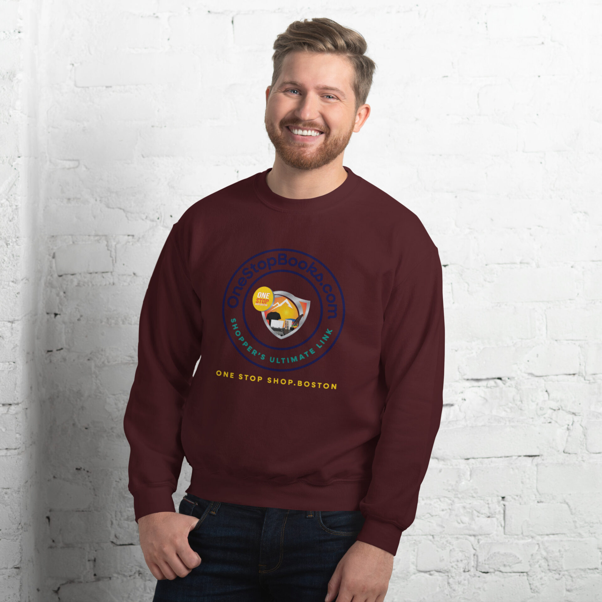 Man wearing a maroon sweatshirt with a logo.