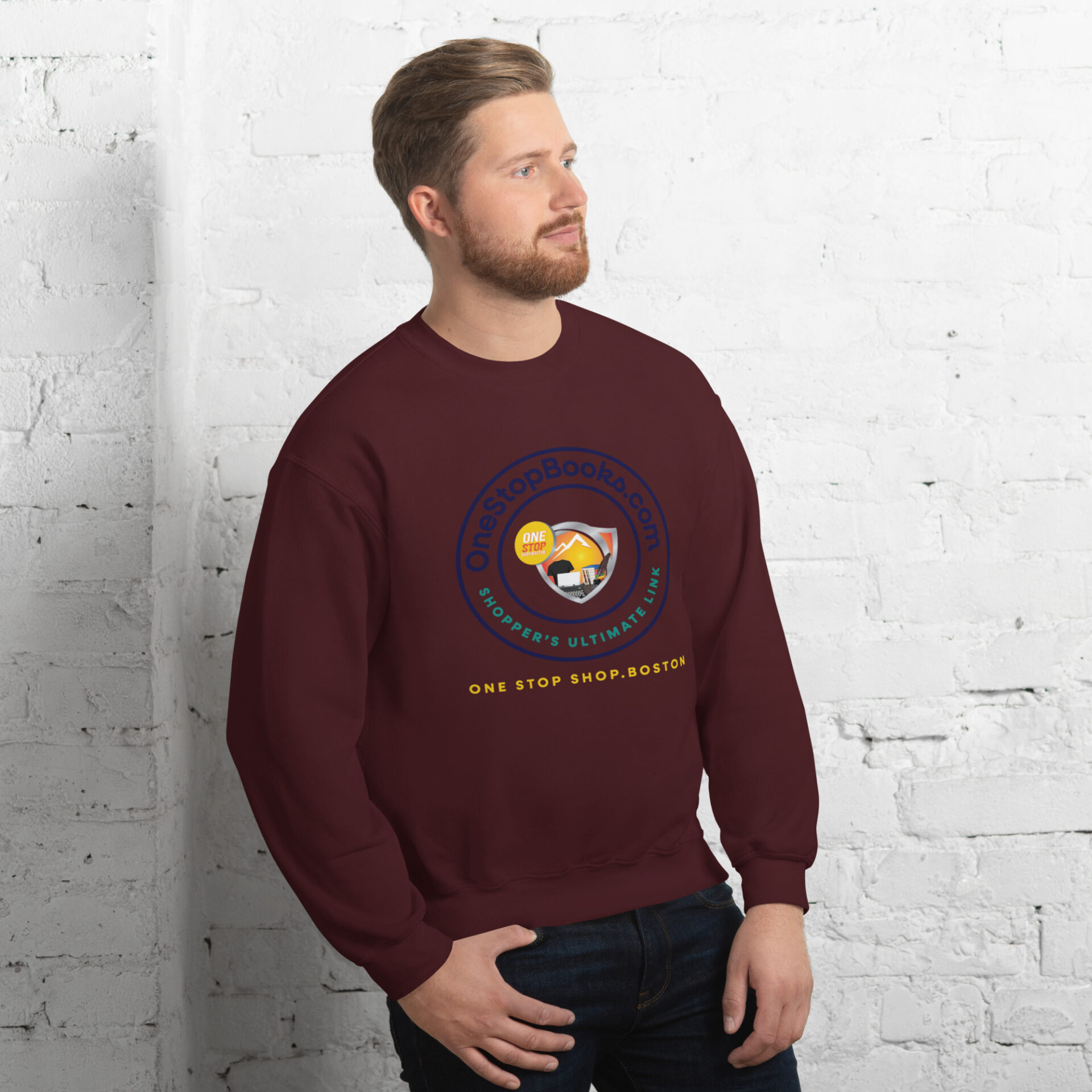 Man wearing maroon sweatshirt with logo.