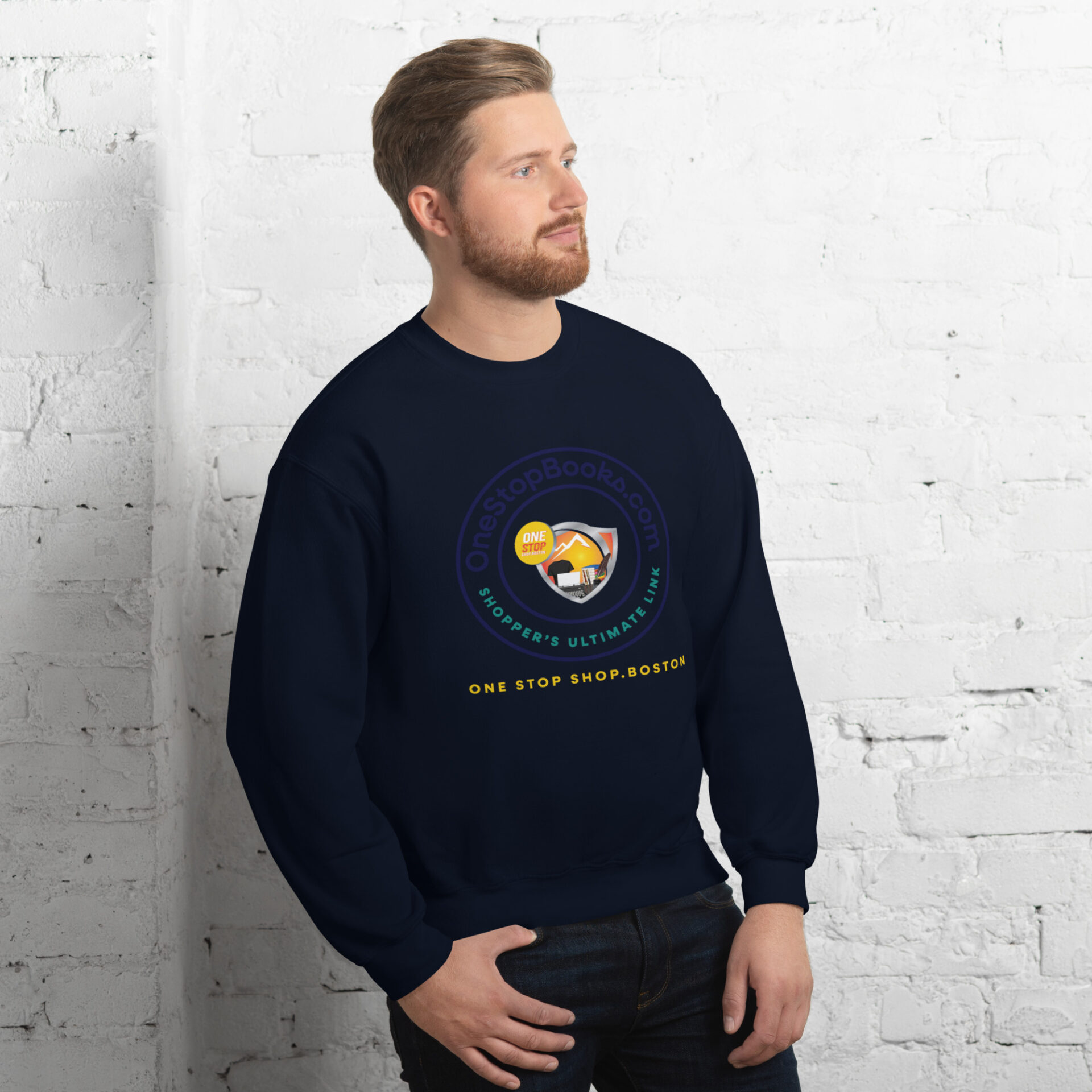 Man wearing a navy blue sweatshirt with a logo.