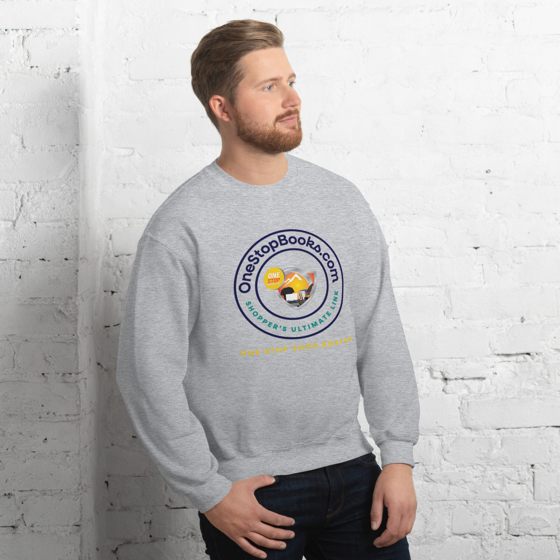 Man wearing a grey sweatshirt with a OneStopBooks.com logo.