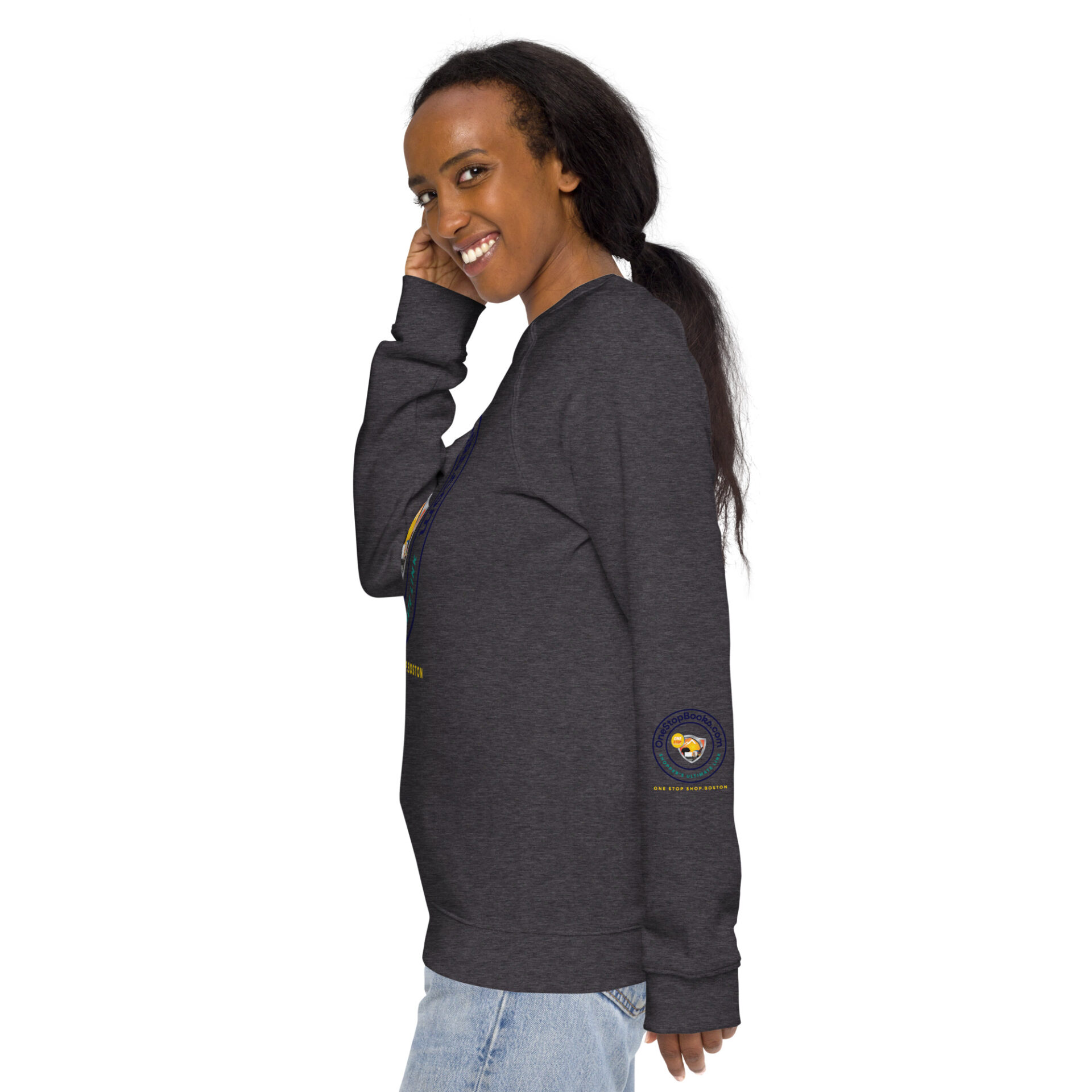 Woman wearing dark grey sweatshirt with logo.