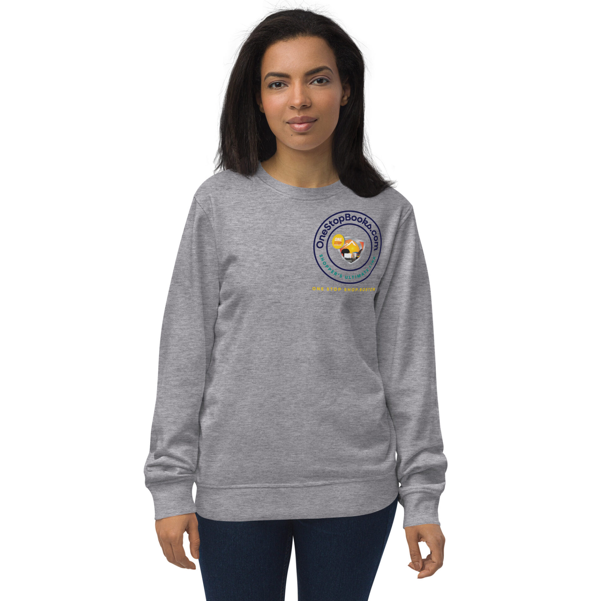 Woman wearing a gray sweatshirt with a logo.