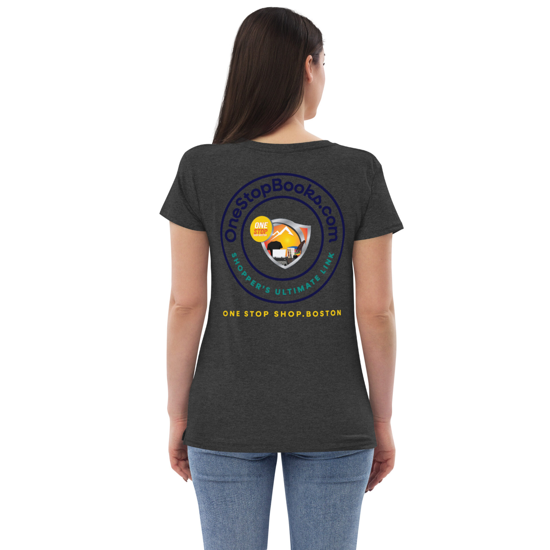 Woman wearing a gray shirt with a logo.