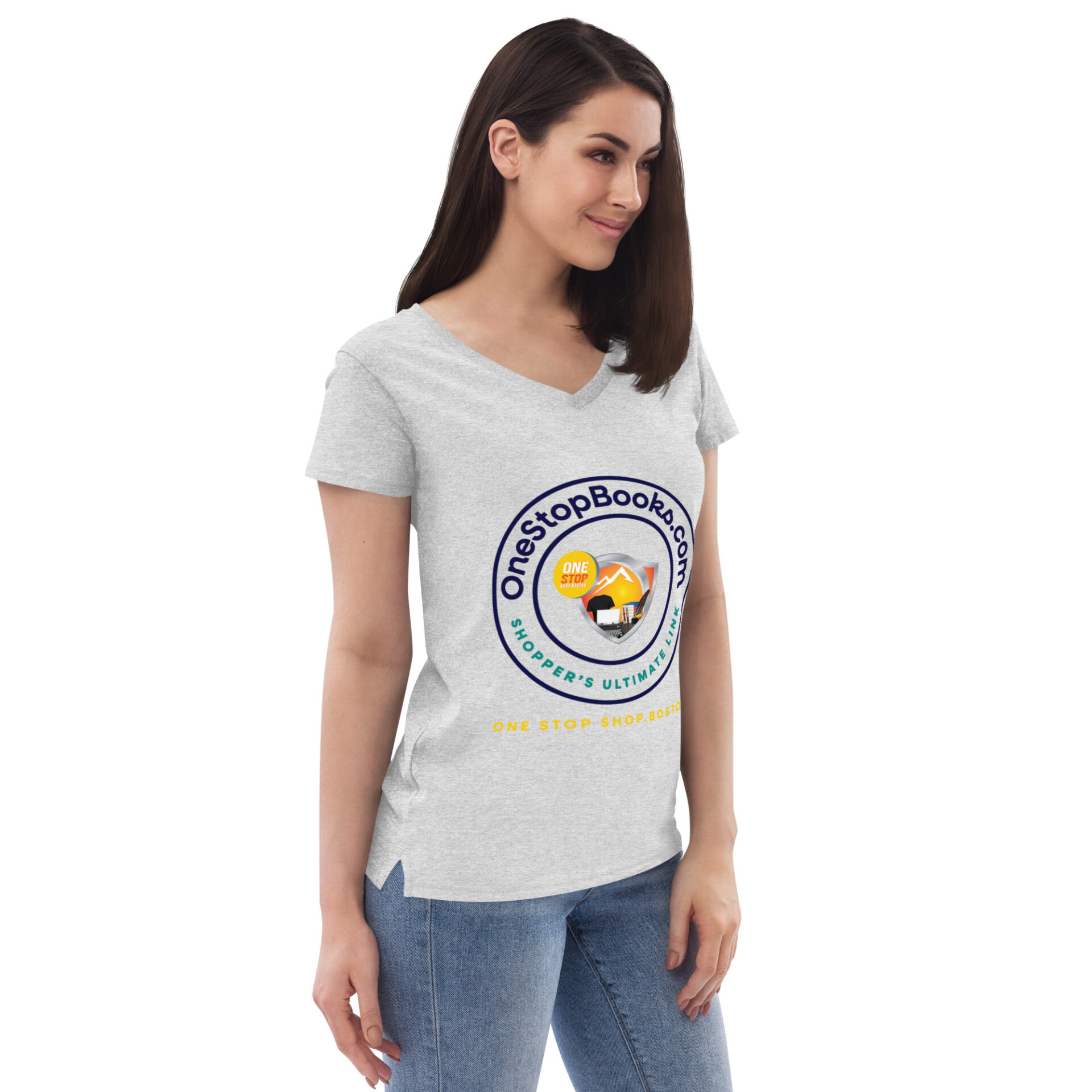 Woman wearing a gray shirt with a logo.