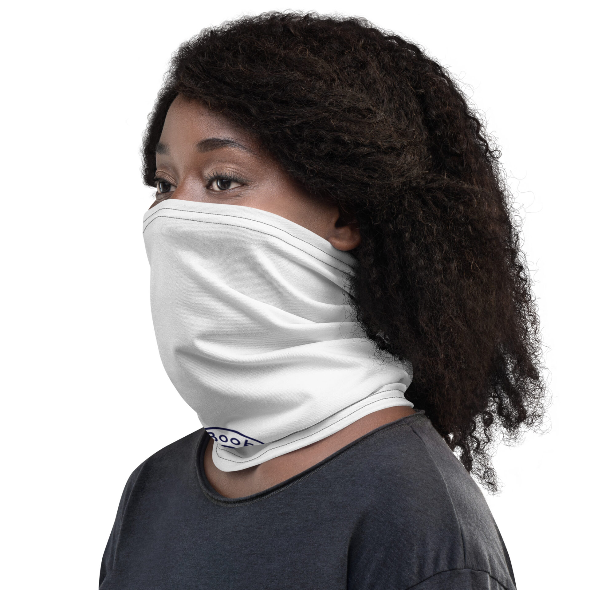 Woman wearing a white face mask.