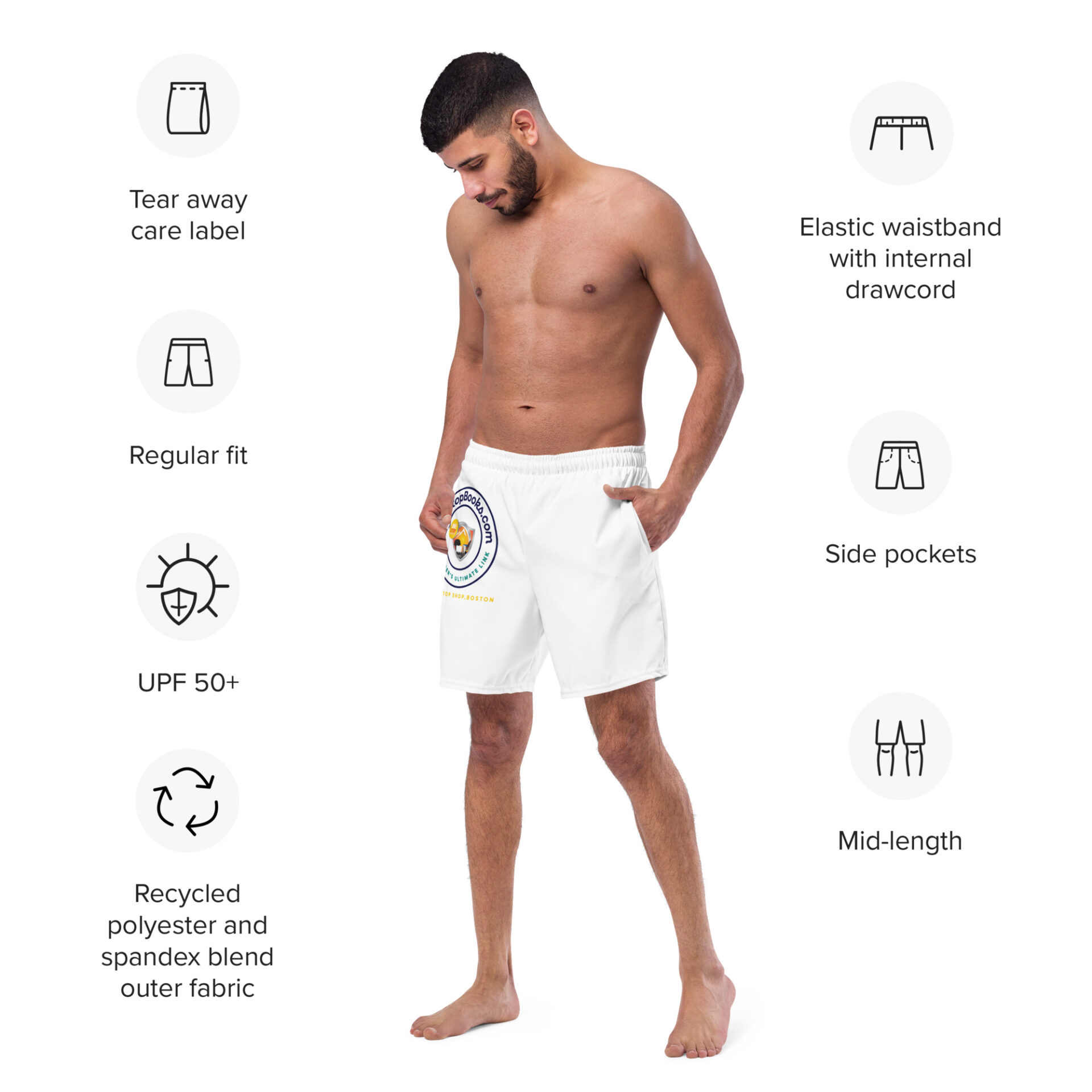 Man wearing white shorts with logo.